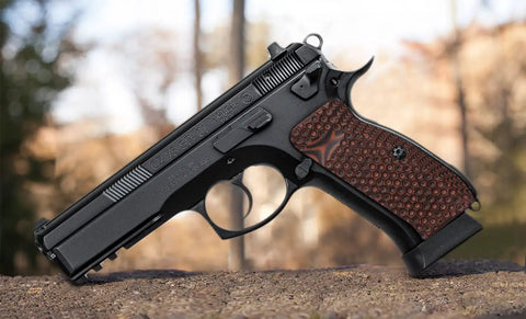 Side view of handgun with Palm Swell Grips For CZ 75 Full Size Orange Black G10 With Palm Texture Free Screws
