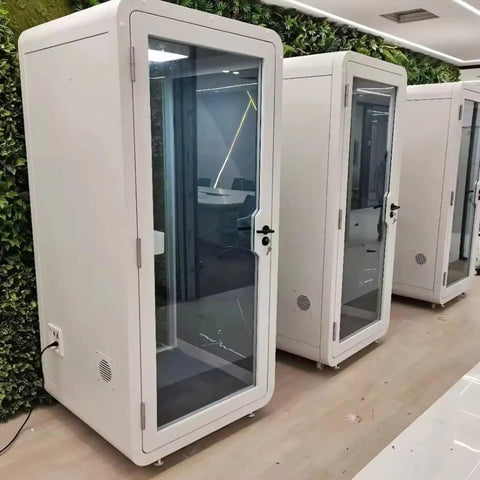 Portable One To Two Person Soundproof Office Pod With Thick Acoustic Panels and Whisper Quiet Ventilation, white exterior and glass door.