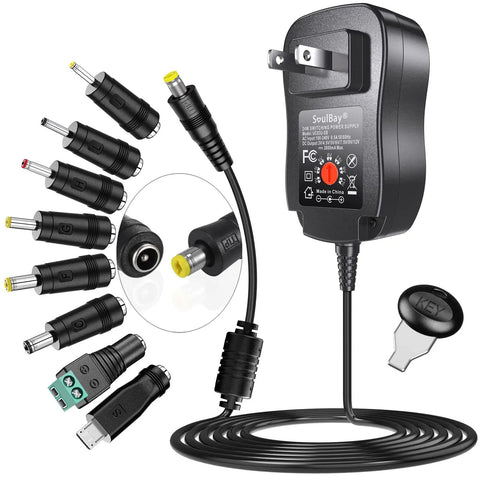 Universal 24W Power Adapter With 8 Selectable Plugs For LED Strips Cameras Keyboards Speakers Scales Recorders And Massagers Regulated Switching Supply 2A Output Supports 12V 9V 7.5V 6V 5V 4.5V 3V 100 To 240 Volt Input.
