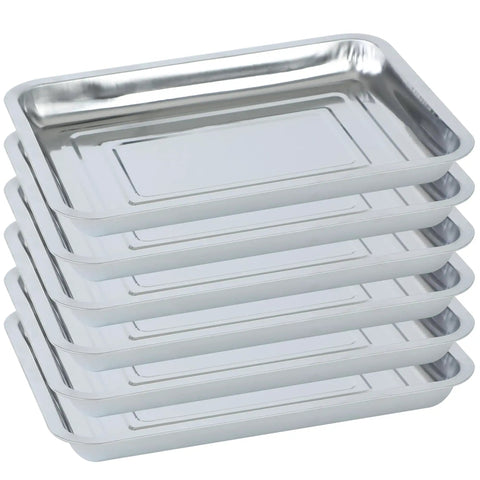 Stack of shiny six pack stainless steel seed starter trays for germination seedlings and water collection nursery use