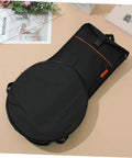 Durable Portable Drum Storage Bag In Black Oxford Fabric For Practice Pads Percussion Gear And Accessory Organizer on flat surface.