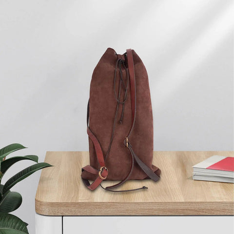 Medieval Style Backpack For Travel And Outdoor Adventures With Adjustable Straps Your Go To Rucksack For Men And Women Great For Hiking Camping Cosplay Daily Use Coffee Color 28x45 cm, displayed on a wooden table.