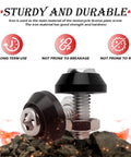 4Pcs Motorcycle License Plate Screw Kit With Sturdy Bolts For Quick No Fuss Fastening, showing durable iron screws on rocks