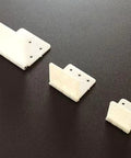 Three sizes of Six Piece Nylon Hinges Kit for RC aircraft, showcasing pro-grade foldable durable aircraft hardware on dark background.