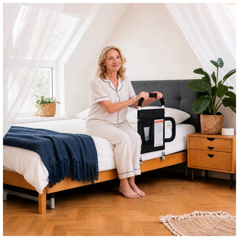 Woman using Granny Friendly Bed Rail With 2 Grab Bars And Storage Pocket For Safe Bed Access Fall Prevention Guard fits King Queen