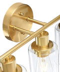 Three Light Matte Black Vanity Light With Clear Glass Shades For Bathroom Modern Wall Sconce Over Mirror With Adjustable Up Or Down Mount Sleek Vanity Fixture Delivering Bright On Trend Illumination brass finish close-up