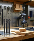 No Nonsense Center Punch Set With Rock Solid High Carbon Steel Build, three punches on workbench near wood pieces.