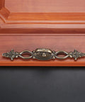 Vintage Style Antique Bronze Cabinet Pulls Handles on Wooden Drawer