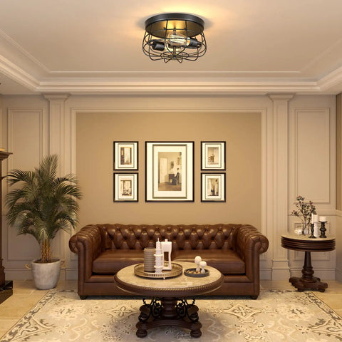 Two Light Industrial Farmhouse Ceiling Light With Dope Black Metal Cage in a living room setting
