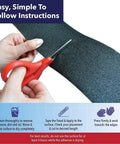 Hands using scissors to cut Kickass Anti Skid Safety Tape For Outdoor And Indoor Floors Black Heavy Duty Grip Strips.