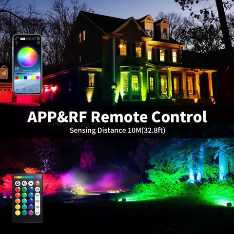 2 Pack 60W RGBW LED Flood Lights with Bluetooth App Control illuminating house and garden in vibrant colors at night.