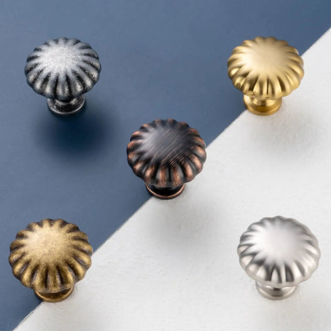 Assorted metal cabinet knobs on split background showcasing Antique Brass Cabinet Knobs One And A Quarter Inch Ten Pack Single Hole Drawer Pulls For Kitchen Cabinets Dressers Desks Bedroom Vanities Cupboards And Bathrooms Durable Rust Resistant Metal Hardware