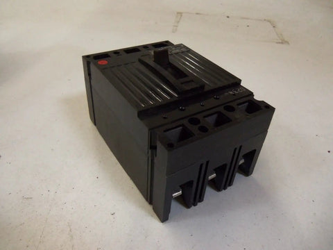 Pro Shop Grade Three Pole Circuit Breaker With Thermal Magnetic Switching Rated For 20 Amps And 240 Vac Panel Boxes side view on white background