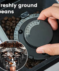 Freshly ground coffee beans in an automatic coffee maker, featuring adjustable grind settings for cafe quality brews.