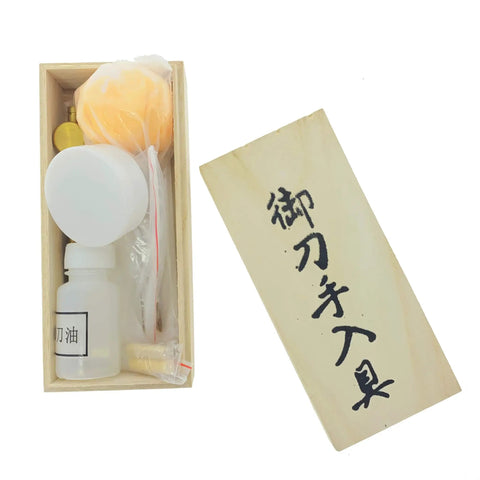 Pro Grade Japanese Samurai Katana Sword Maintenance Cleaning Kit with Uchiko ball, sword oil, and wooden storage box open