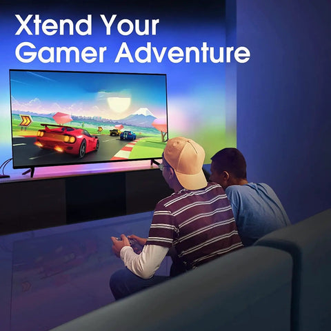 Two people gaming with RGBIC LED TV Backlight Strip For 55 To 65 Inch TVs With Screen Sync and Music Control in a dark room.