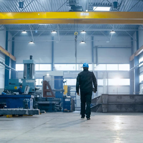 Industrial warehouse with bright illumination from two pack 200W UFO LED high bay light with 5000K color temperature