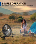 Go-To 16 Inch Rechargeable Outdoor Floor Fan With 15,600mAh Battery next to woman sitting near a tent in a field