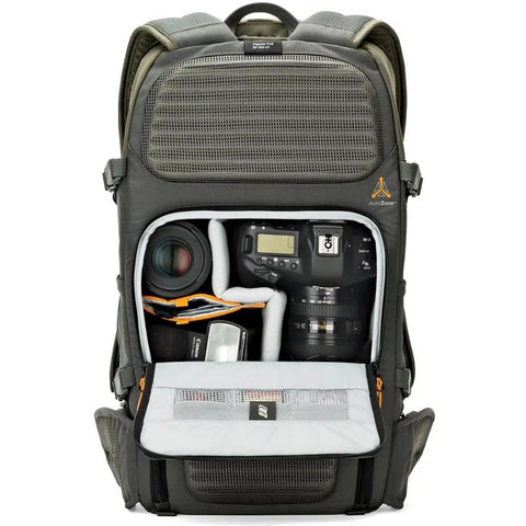 Flipside Trek BP 450 AW Camera Backpack With All Weather Cover showing organized camera gear compartments, grey and dark green design