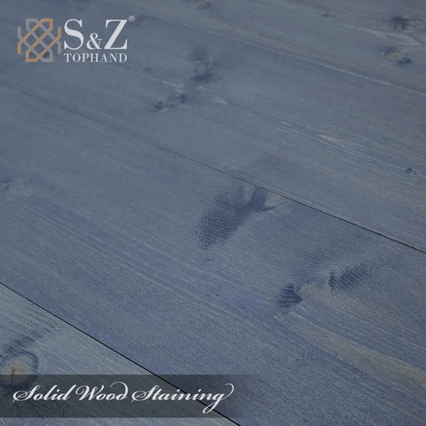 Rock Solid 28 By 84 Inch Sea Blue Natural Spruce Barn Door With Top Tier Five Foot Stainless Steel Sliding Track Hardware Kit close-up of stained spruce wood.