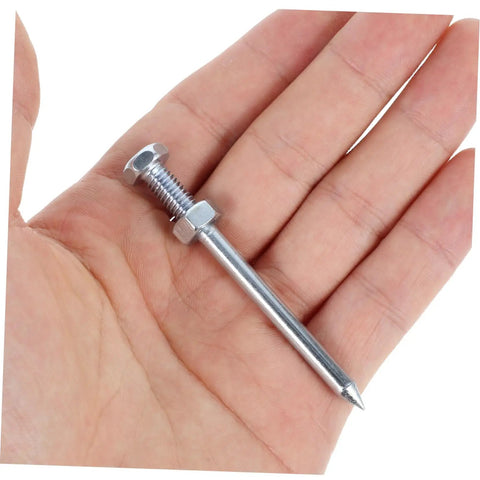 Silver metal spike for Heavy Duty Lawn Aerator Shoes With Metal Spikes For Deep Soil Aeration And Lawn Health held in hand