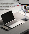 Lit LED Spaceship Model Kit For Display In One Thousandth Scale Lifelike Spaceship Ornament on desktop next to laptop