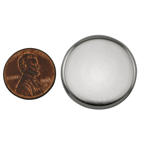 12 Pack Stainless Steel Knockout Plugs For Electrical Boxes Featuring Knurled Grip And No Sweat Tap In Install Rock Solid Seal shown beside a penny for size comparison.
