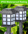 20 Pack Solar Pathway Lights For Outdoors under rain, showing IP55 waterproof LED lighting with cold white glow in garden.