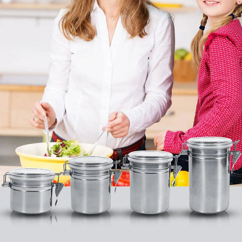 Heavy Duty Airtight Stainless Steel Coffee Canister Keeps Your Daily Grind Fresh And Locked Tight For Kitchen Storage Holds Sugar Tea And Coffee Beans In Medium Sized Jars with woman and girl cooking.