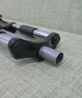 Close-up of 26 Inch Mountain Bike Suspension Fork With 1-1/8 Threadless Steerer Double Shoulder Triple Tree in black.