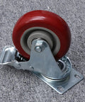 Red TPR Swivel Caster Wheels with Brake 2pcs for Furniture Parts, close-up view showing the wheel and metal base.