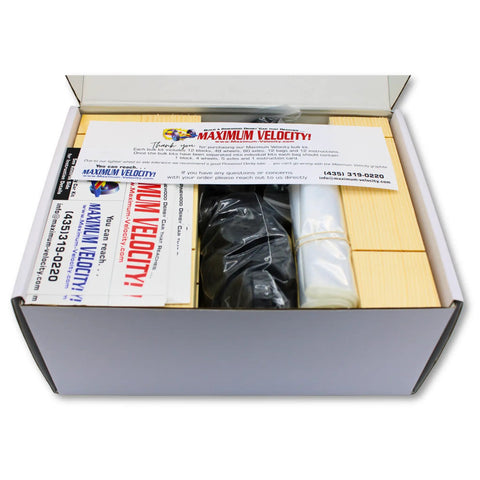 Bulk Pinewood Derby Car Kits Pack Of 12 With Wheels And Axles, open box showing pine blocks and accessories