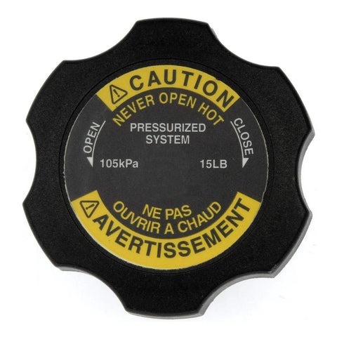 Direct Replacement Engine Coolant Reservoir Cap For Select Heavy Duty Trucks, shows caution label and pressure specifications