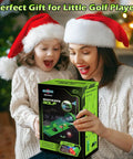 A woman and child with Santa hats smiling next to an Upgraded Kids Golf Set With Dinosaur Automatic Returner Light Up Night Golf Balls 3 Clubs Putting Mat Ages 3 To 8 Mini Golf Game Kit for Indoor And Outdoor Play Fun Educational Sports Toy For Boys And Girls box.