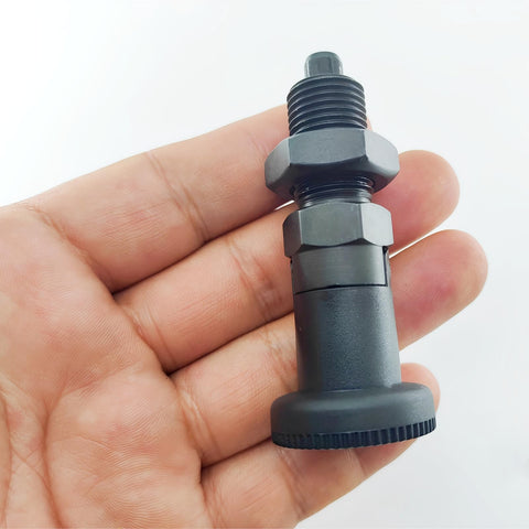 Close-up of Two Pack Push Fit Ball Nose Spring Plungers With M12x1.5 Threads Carbon Steel Self Locking Indexing Plungers in hand.