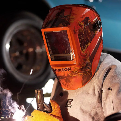 Person welding while wearing Premium Graphic Auto Darkening Welding Hood With ADF, Ultra Lightweight 1.26 Lb Helmet, ANSI Z87.1 Rated