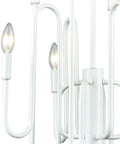 Close-up of Decatur 8 Light Matte White Chandelier For Ceiling Mount, metal fixture with lit bulbs, modern farmhouse decor.