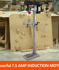 Heavy Duty Floor Drill Press With Genuine Copper Motor in workshop, sturdy cast iron base, 7.5 AMP motor, designed for wood and metal.