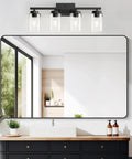 Top Shelf Four Light Bathroom Vanity Fixture With Slick Matte Black Frame And Knockout Clear Glass Shades over sink, modern home decor.