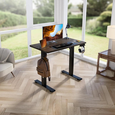 Kingant Standing Desk 35X20 Inch Electric Height Adjustable Computer Desk With Quiet Smooth Lift Motor And Easy Control Panel in home office setting.