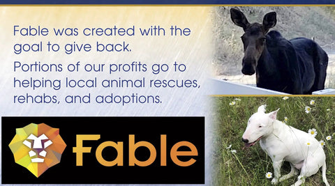Fable brand logo with images of a black mule and a white dog, highlighting the company's support for animal rescues and adoptions.