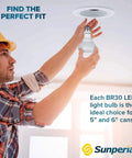 Person installing 12 Pack BR30 LED Flood Bulbs 8.5W Equivalent 65W 3500K Natural White 800 Lumens Dimmable in recessed ceiling can