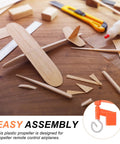 Wooden model airplane kit parts on table with text about easy assembly propeller design