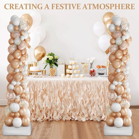 Balloon column stand kit with adjustable poles and stable bases beside a dessert table with rose-gold and white balloons