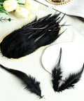 Black Saddle Hackle Rooster Feathers Bulk 200 Pcs 5-7 Inch 12-17 Cm displayed on a table for DIY crafts.