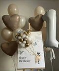 Giant Forty Inch Beige Mylar Foil Number 1 Balloon With Straw For First Birthday And Age Milestone Party Decorations displayed with heart balloons.