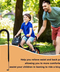 Dad assisting son on bike with Adjustable Bike Training Handle For Kids, Parental Stabilization Bar And Multi Position Balance Trainer