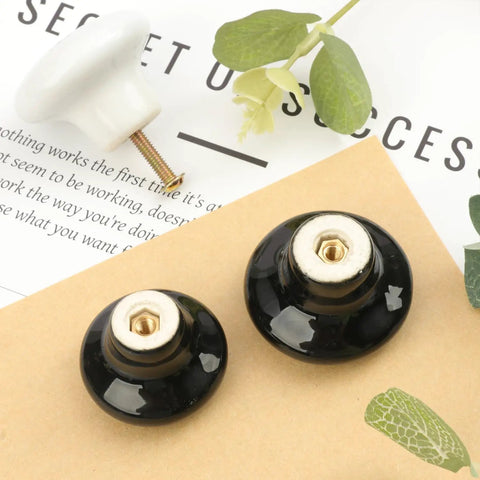 40 Pack Black Ceramic Cabinet Knobs Set With Glossy Mushroom Style Finish shown with screws and leaves for cabinets and drawers
