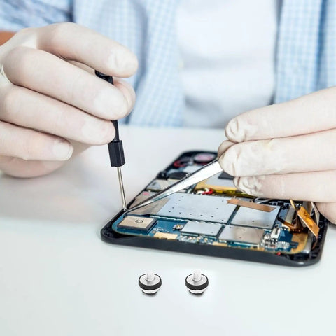 Person using Slick Black M3 Hard Drive Screws For Dead Simple Desktop Laptop Mounting Tight Grip Miniature Computer Fasteners 10Pc Shock Absorbing Kit.