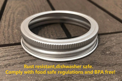 Rust Resistant Silver Aluminum Mason Jar Bands 12 Pack For Wide Mouth Jars Food Safe And BPA Free Aluminum Rings on wooden surface